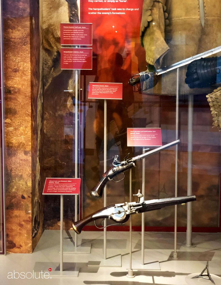 Exhibition at the National Army Museum showcasing weapons, using pinnacle label holders to display related information.